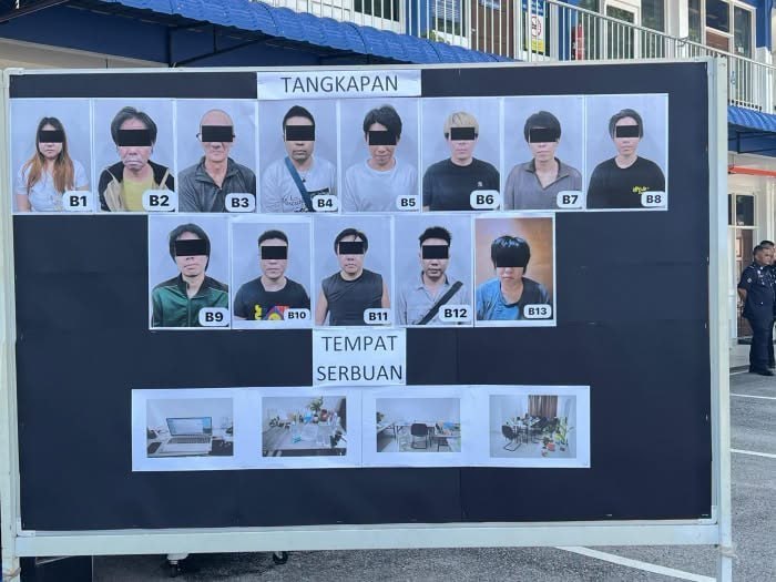 马来西亚警方在霹雳州金宝突击捣毁一处电话诈骗中心,逮捕13名涉嫌冒充日本警察诈骗…