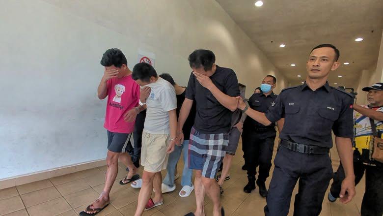 马来西亚关丹推事庭宣判18名诈骗犯
