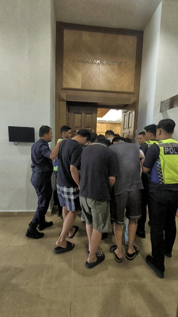 马来西亚关丹推事庭宣判18名诈骗犯